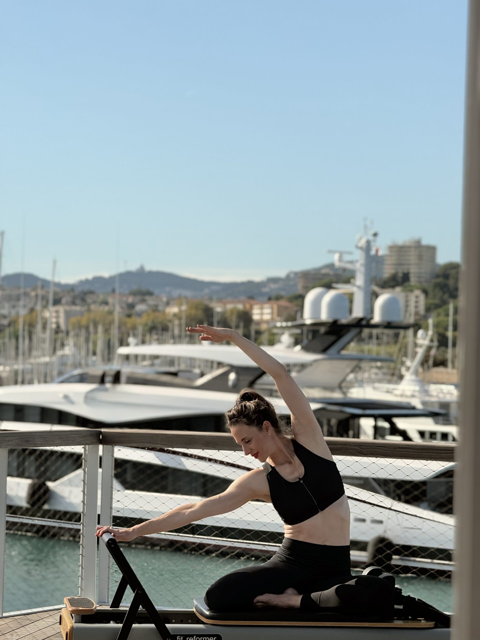 Bianca doing pilates on villa reformer