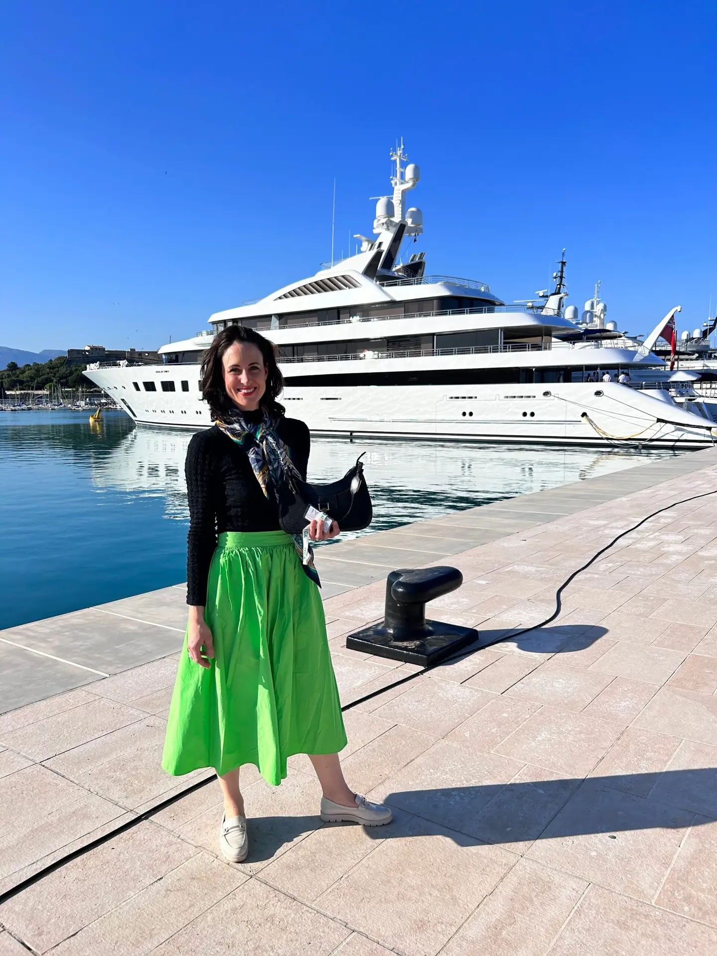 Bianca with a yacht in the background