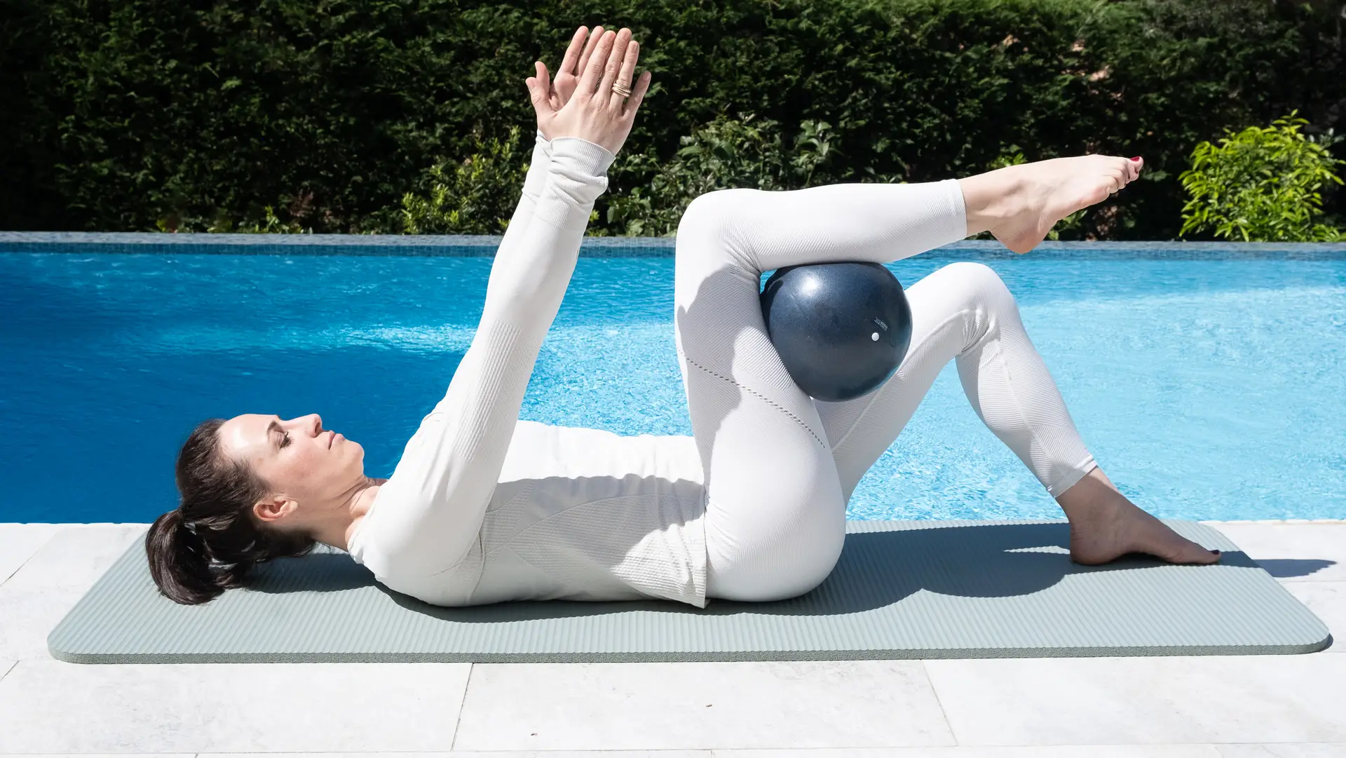 Bianca at a villa doing pilates